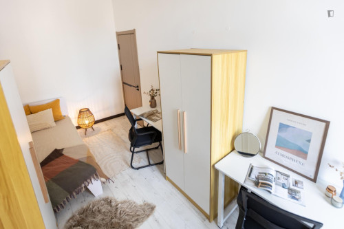 Bed in an interesting twin bedroom, near the Budapest-Keleti train station