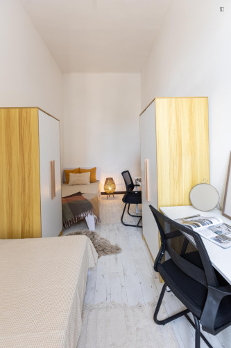 Bed in an interesting twin bedroom, near the Budapest-Keleti train station