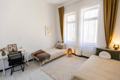 Bed in inviting twin bedroom near Budapest-Keleti station