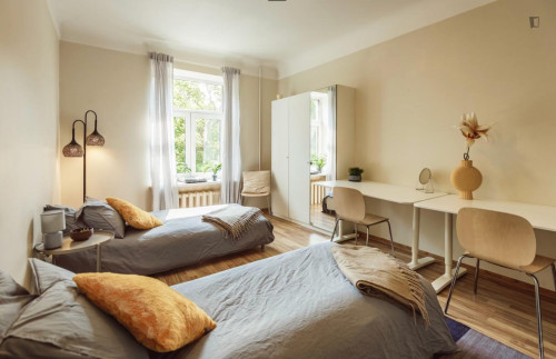 Bed in bright twin bedroom near Budapest-Keleti station