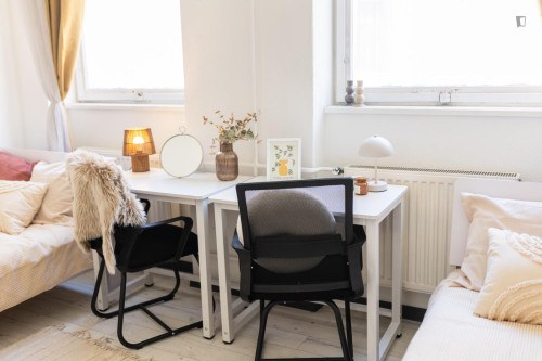 Bed in neat twin bedroom near Budapest-Keleti station