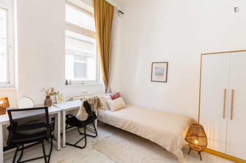 Bed in neat twin bedroom near Budapest-Keleti station