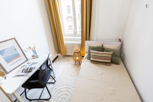 Bed in an inviting twin bedroom, in District VII