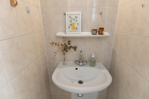 Bed in neat twin bedroom in the centre of Budapest