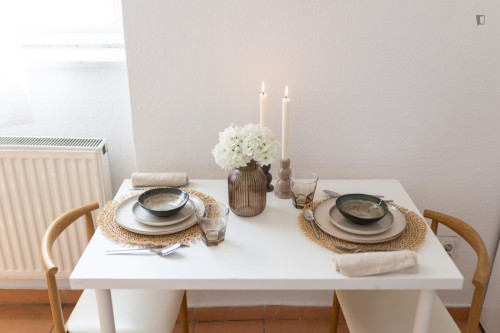 Bed in neat twin bedroom in the centre of Budapest