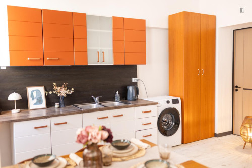 Bed in neat twin bedroom near the centre of Budapest