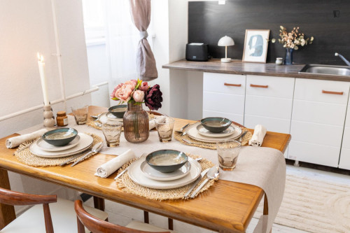 Bed in neat twin bedroom near the centre of Budapest