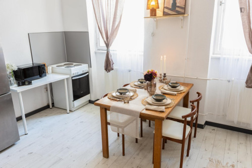 Bed in neat twin bedroom near the centre of Budapest