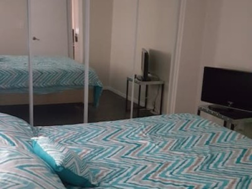 Clean and furnished room.