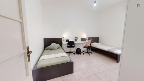 Multiple beds bedroom in 3-bedroom apartment