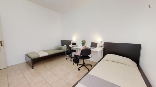 Multiple beds bedroom in 3-bedroom apartment