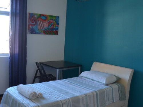 Sunny room in central Curitiba 