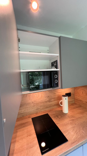 Modern apartment with a view of the greenery
