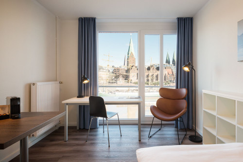 Beautiful apartment on the banks of the Weser with panoramic view of the historic old town, directly in the centre of town