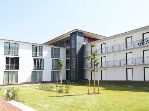 Rooftop Apartment by Rabe Balcony Fitness Coworking Parking Washing machine