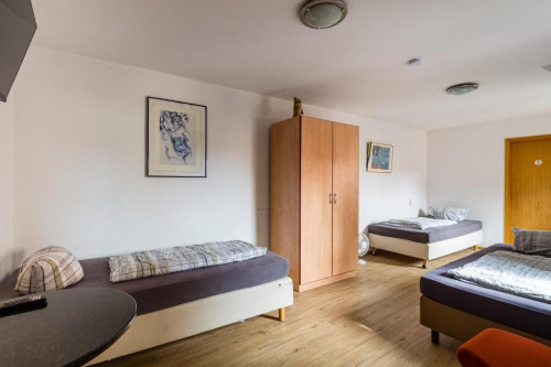 Gemütliches Apartment mit 3 Einzelbetten – zentrumsnah & voll ausgestattet