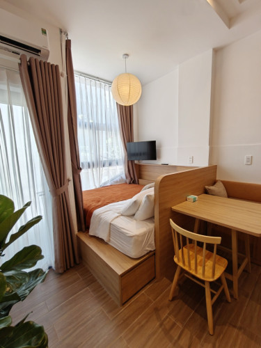 Modern Coliving Townhouse with Private Studios in Vibrant Tan Dinh District
