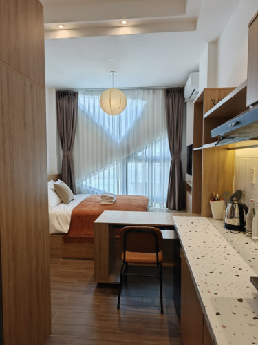 Modern Coliving Townhouse with Private Studios in Vibrant Tan Dinh District