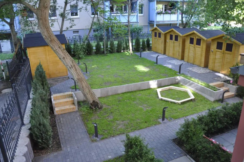 furnished designer attic - in a renovated old building with balcony - near the Havel river