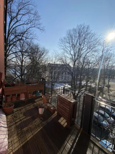 furnished designer attic - in a renovated old building with balcony - near the Havel river