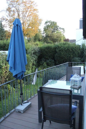 3 rooms with designer furniture and art, with chimney, great balcony, popular location