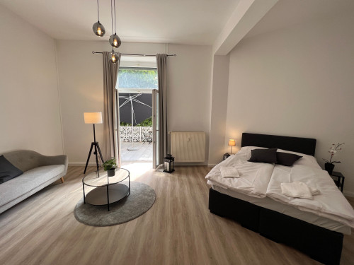 Cozy-Livings / Old building with terrace at the city park