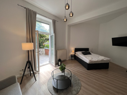 Cozy-Livings / Old building with terrace at the city park