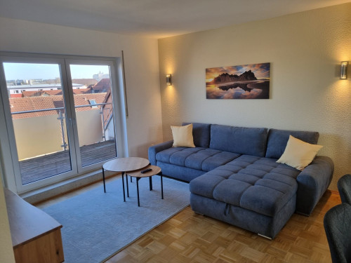 tylish, modernized 2.5-room attic apartment with high end interior and fitted kitchen in Gießen.
