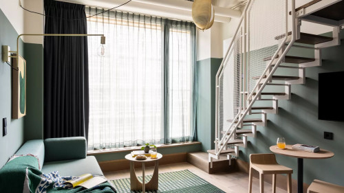 Modern apartment mezzanine (with 2 beds or a couch) inclusive of outdoor pool, co-working and gym in Munich Obersendling