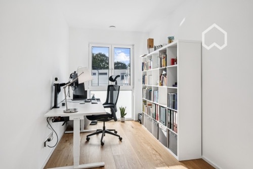 Furnished, newly built apartment w. heated floors, parking garage and modern amenities