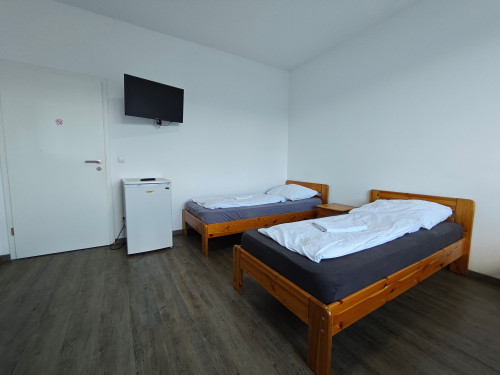Spacious worker apartments with roof terrace - Gallery - 26
