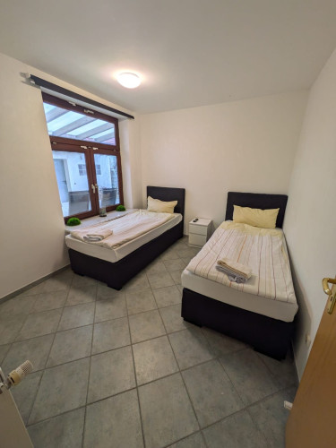 Modern 3-Bedroom Apartment with TV in Every Room & Covered Terrace