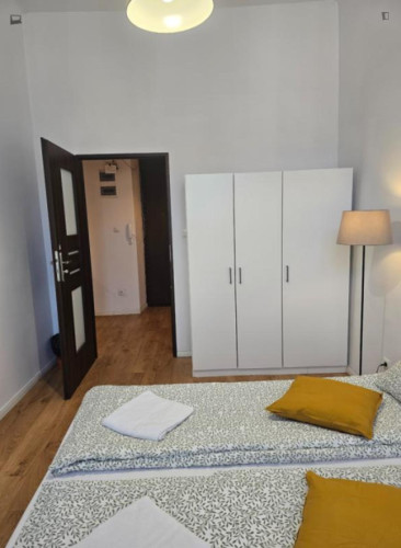 Bright bedroom in 4 bedroom apartment
