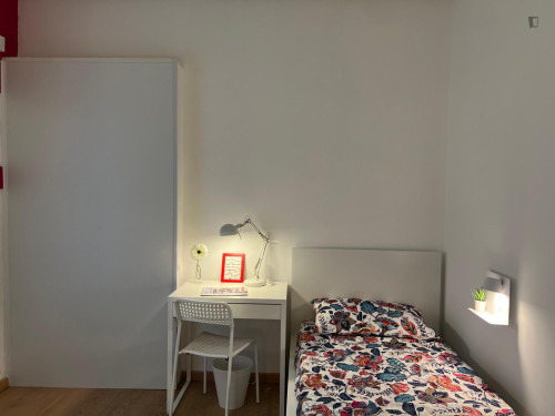 Bed in a bright twin bedroom in Garibaldi Repubblica