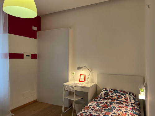 Bed in a bright twin bedroom in Garibaldi Repubblica