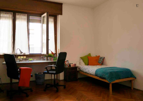 Bed in a welcoming twin bedroom, in Città Studi - Politecnico