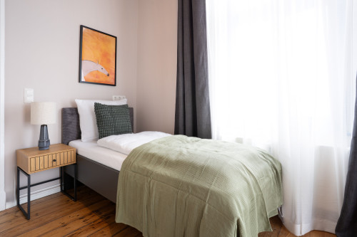 Three-Bedroom Apartment with balcony
