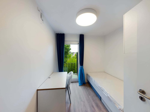 Reduced Rent -  Fully furnished private room with Balcony in a 5 people shared mixed apartment