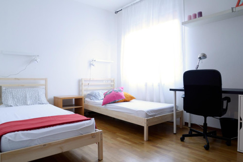 Bed in neat twin bedroom in Bicocca