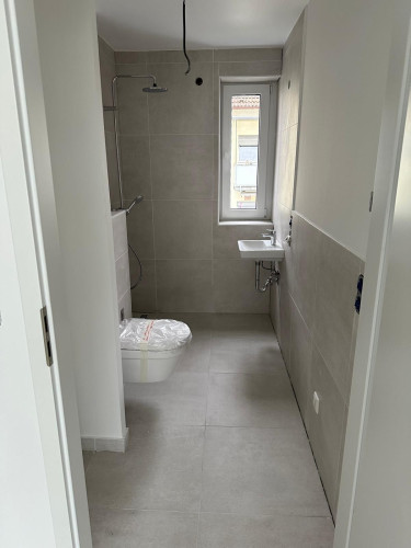 Brand-New Furnished Lower-Ground 2-Bedroom Apartment with Small Shared Balcony in a QNG-Certified Green Building in Kelsterbach