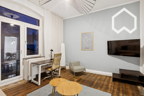 Modern Central Apartment with 2 Rooms, Separate Kitchen, and Balcony