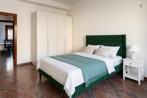 Elegant single bedroom with a balcony in a 5-bedroom apartment