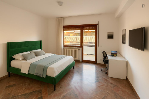 Elegant single bedroom with a balcony in a 5-bedroom apartment