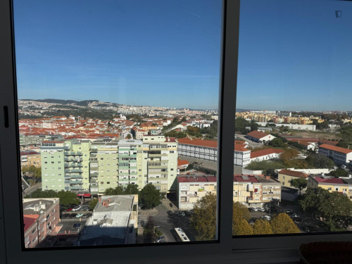 Bright bedroom with balcony next to the metro