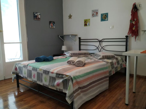 Welcoming double bedroom with a balcony, in Vathi