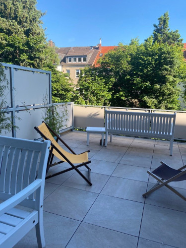 Quiet and green terraced apartment with underground garage