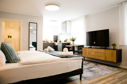 Modern & Cozy Studio with Designer Kitchen, Dining Area & Smart TV