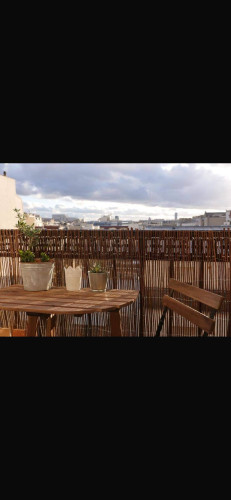 Studio meublé au dernier étage avec balcon et vue panoramique – Paris 11e