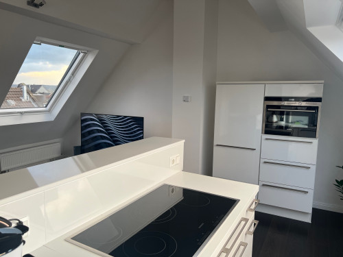 Modern and charming apartment with AC in historical building in walking distance to the ICE train station.