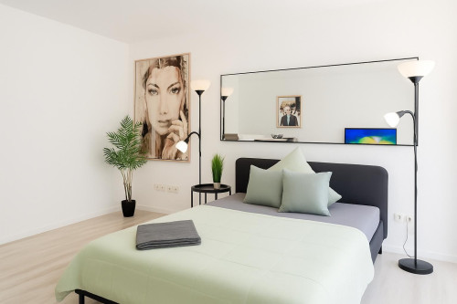 Stylish modern fully-furnished single room apartment with balcony and open kitchen in Neuhausen for 2 tenants